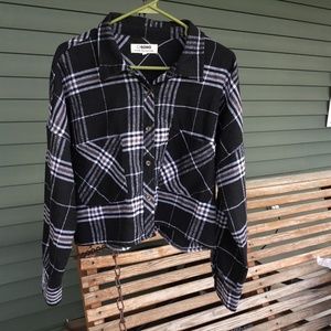 Cropped boxy flannel shirt.